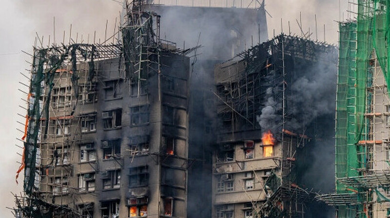 Пожар в Гонконге локализован, число жертв достигло 128